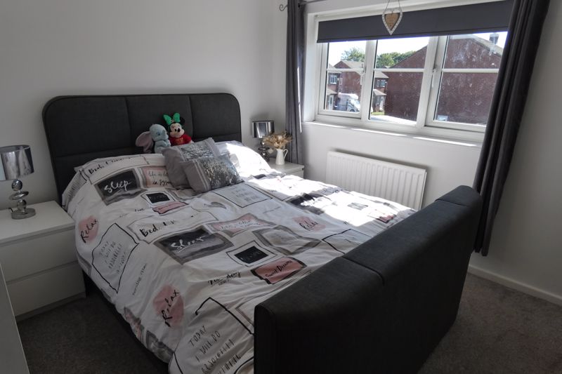 Bedroom One- click for photo gallery